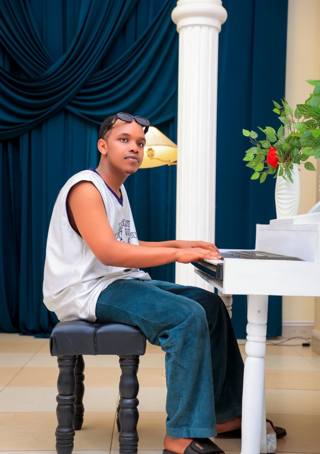 Amza playing piano